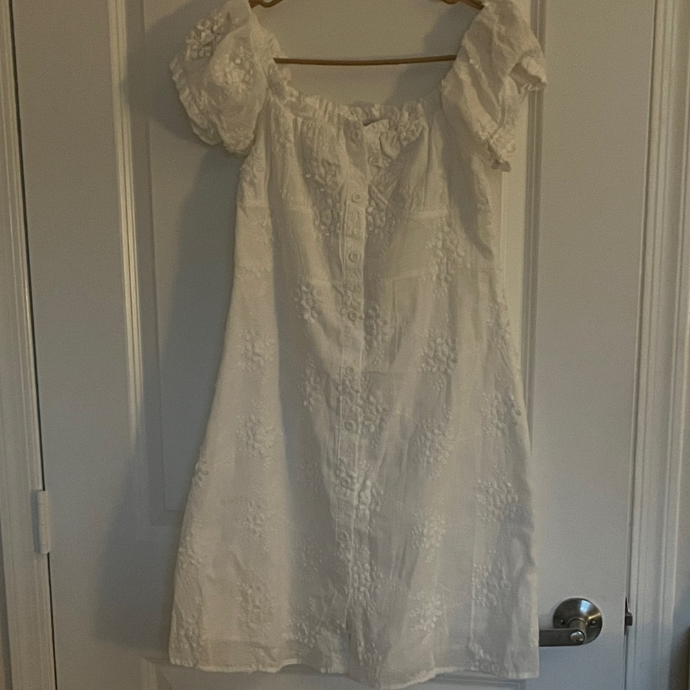 Elegant White Midi Dress with Floral Details